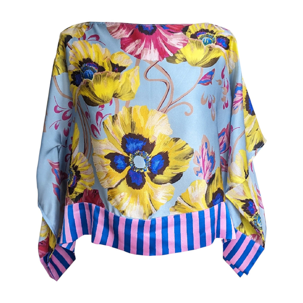 Colourful floral and striped fabric on a white background