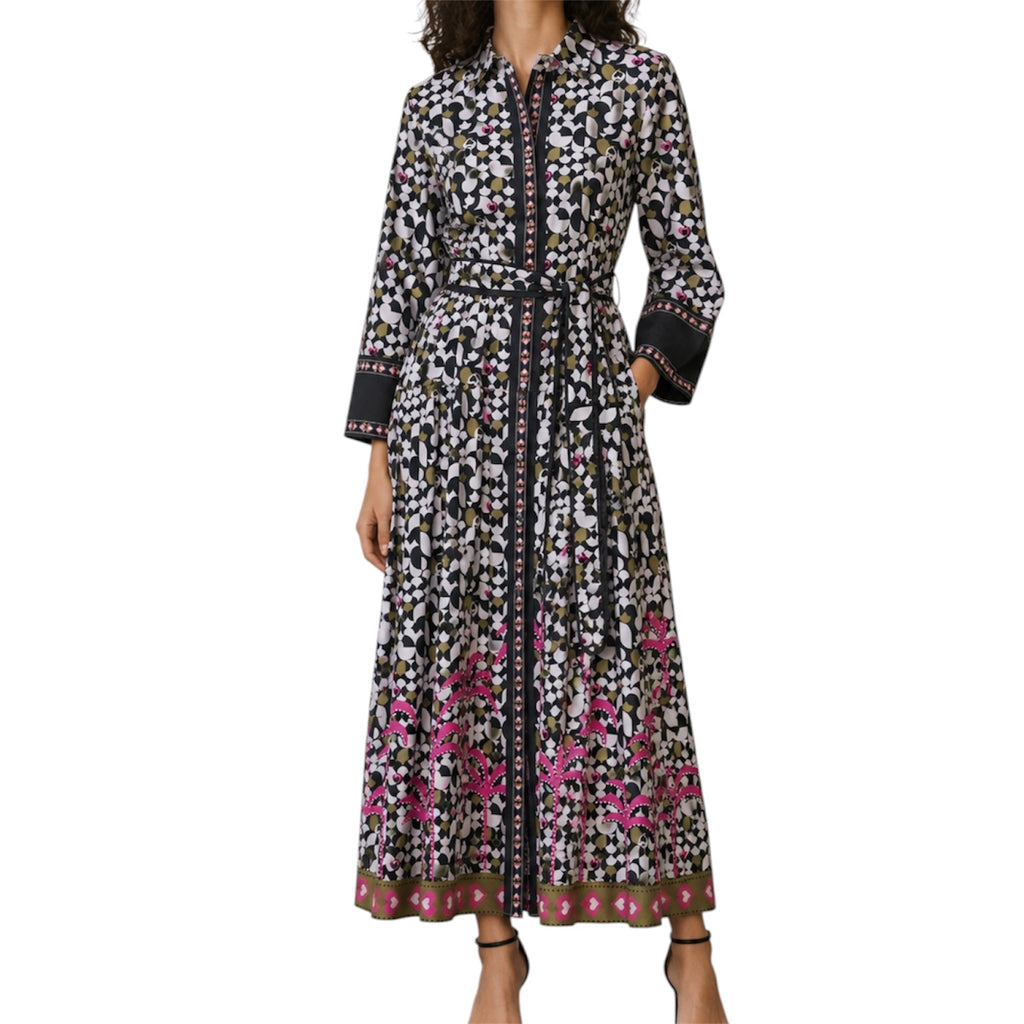 Long floral dress with a patterned belt by Emily Lovelock